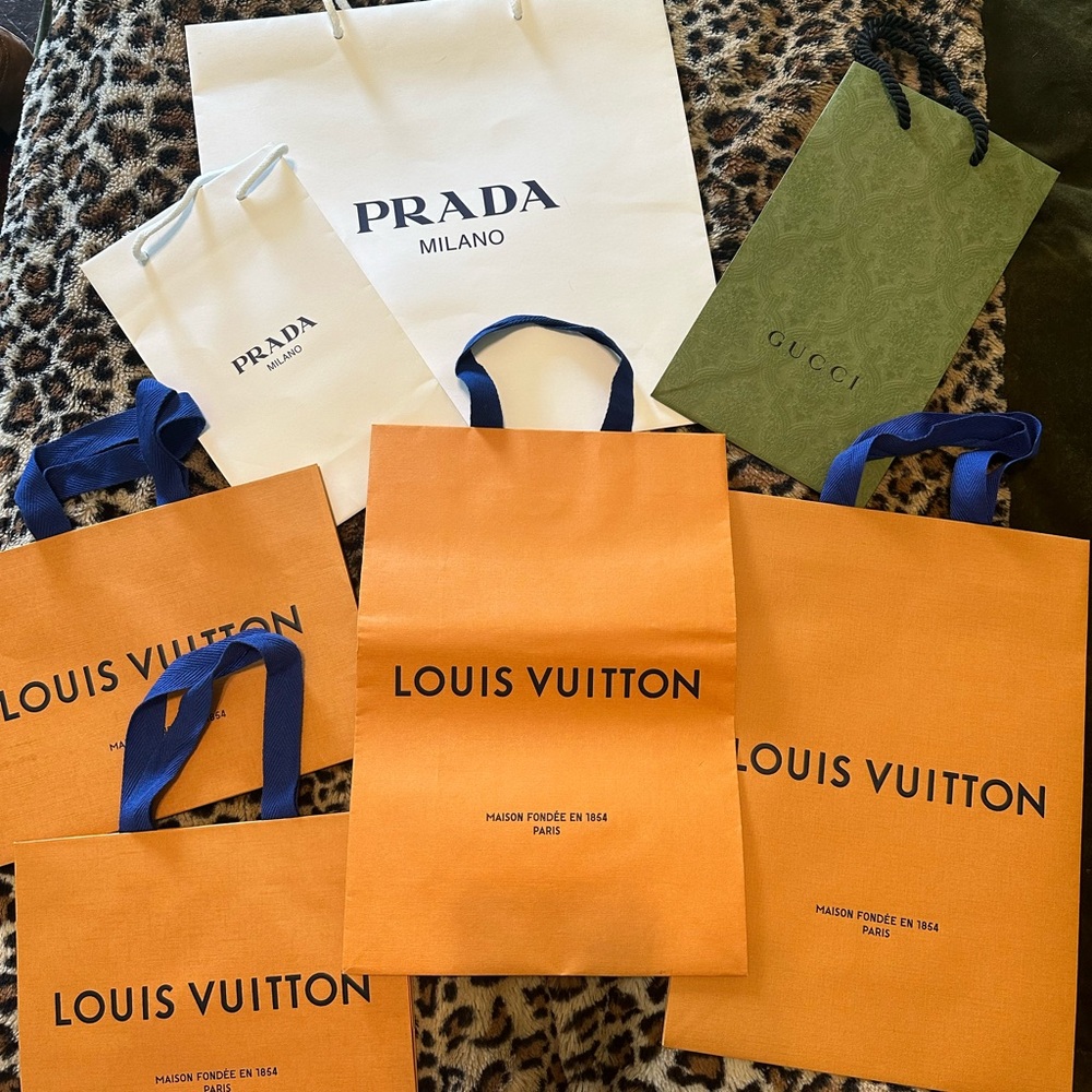 Authentic LV, Prada, and Gucci shopping bags